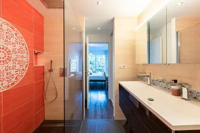 a bathroom with a shower and a sink at Strada Agosta - Terrasse vue mer in Albitreccia