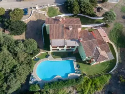 an overhead view of a house with a swimming pool at Sea-view holiday home in Solenzara in Kamiesch