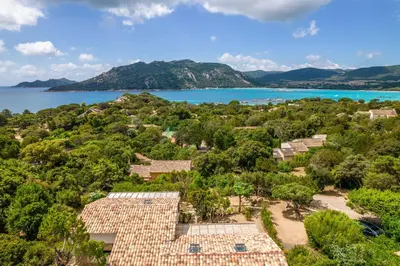 an aerial view of a house and the ocean at Maison Lucciana - Santa Giulia in Porto-Vecchio