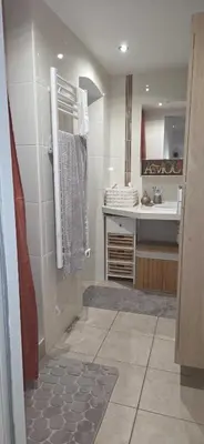 a bathroom with a shower and a sink in a room at Studio en centre ville a 2 minutes de la plage in Ajaccio