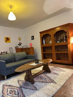a living room with a couch and a coffee table at Casa Bella Centre de Corsica in Corte