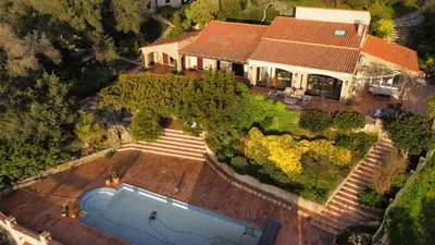 an aerial view of a house with a swimming pool at Casa Campana in Viggianello