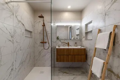 a bathroom with a glass shower and a sink at Magnifique villa 6 chambres avec piscine,Olmeto plage in Olmeto
