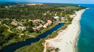 an aerial view of the shoreline of a beach at A nostra casetta corsa,Tania, en bord de mer in Ghisonaccia
