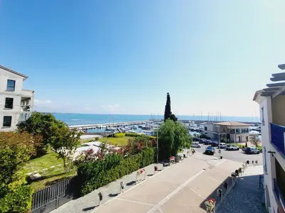 a view of a city from a building at Charmant T2 sur le Port de Plaisance de Solenzara in Sari Solenzara