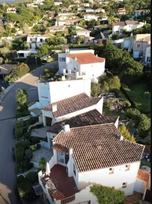 an overhead view of a white house with red roofs at Bas de villa 27 Pietrosella in Pietrosella