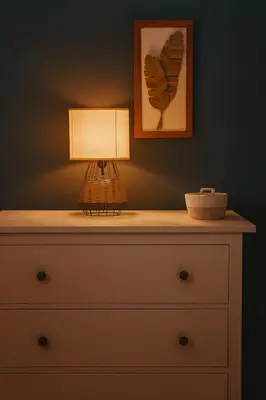a lamp sitting on top of a dresser at Bas de villa 27 Pietrosella in Pietrosella