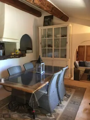 a dining room with a table and chairs at Charming villa # Petra's House in Palombaggia in Porto-Vecchio