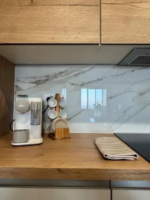 a kitchen counter with a appliance on a counter top at Appartement vue mer et montagne in Olmeta-di-Tuda