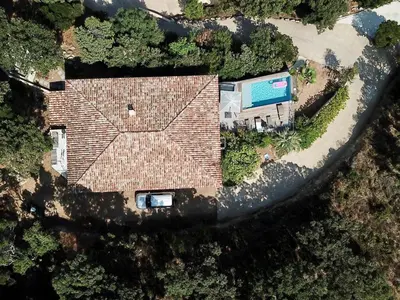 an aerial view of a house with a swimming pool at Villa with pool, sea view, Ste Lucie de Porto-Vecchio in Conca