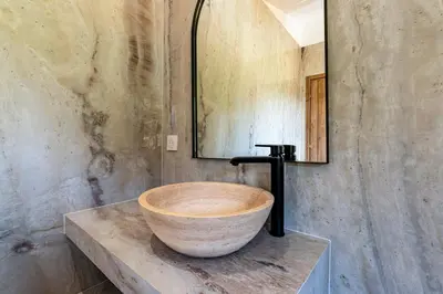 a bathroom with a large bowl sink on a counter at A Casetta Rossa Bergerie a 15 min du centre ville d Ajaccio et 15 min des plages de Porticcio in Ocana
