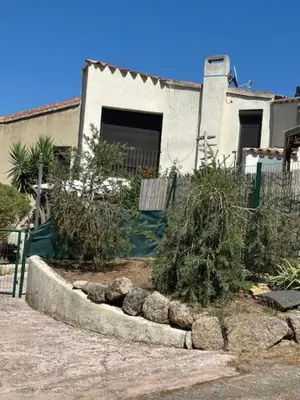 a house with a garden in front of it at Pietrosella Canelli Sea View in Pietrosella