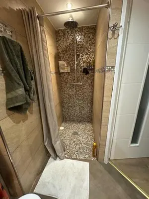 a bathroom with a shower with a toilet and a shower at Pietrosella Canelli Sea View in Pietrosella