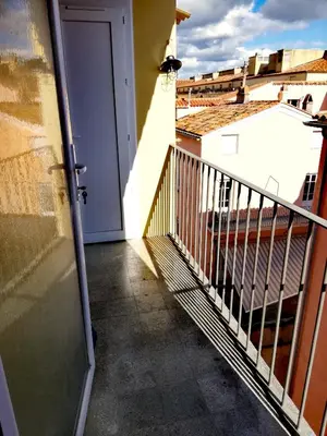 an open door to a balcony with a view at T2 hyper centre ville in Ajaccio