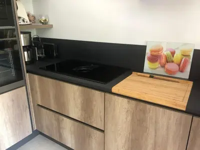 a kitchen counter with a picture of fruit on it at Casa Mana-Y in Zonza