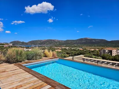 a swimming pool on the roof of a house at Roof Top AVRETTU - Vue Panoramique & Design in Porto-Vecchio