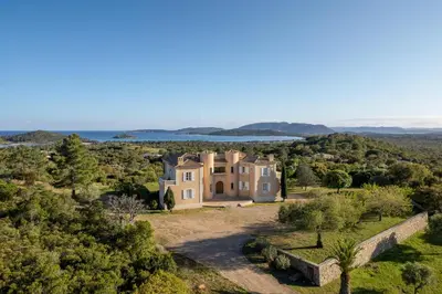 an aerial view of a large house with trees at Château di Cardiccia a Luxury 7-Bedroom Villa with Air Conditioning in Zonza