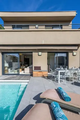 a house with a swimming pool and a patio at Villa Oia - avec piscine privée in Conca