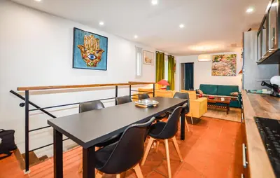 a kitchen and living room with a table and chairs at Awesome Home In Vero With Private Swimming Pool, Can Be Inside Or Outside in Vero