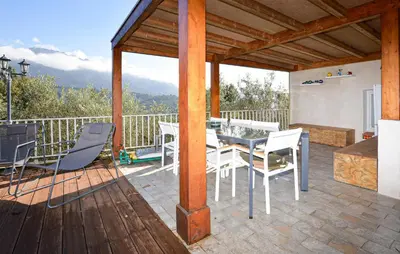 a gazebo with a table and chairs on a deck at Awesome Home In Vero With Private Swimming Pool, Can Be Inside Or Outside in Vero