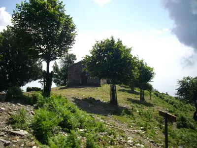 an old house on top of a hill with trees at Apartment Sole e Ventu 30qm by Interhome in San-Giovanni-di-Moriani