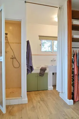 a bathroom with a tub and a sink and a shower at Holiday Home Weingut Punta della guardia zwischen Meer und Gebirge by Interhome in Cervione