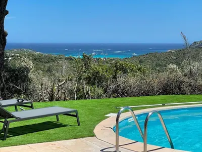 a pool with a table and a bench next to it at Holiday Home Ferienvilla Azura mit eigenem Pool by Interhome in Pascialello