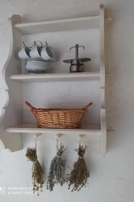 a shelf with a basket and pots and pans at Apartment Sole e Ventu 50qm by Interhome in San-Giovanni-di-Moriani