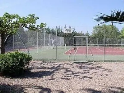 a tennis court with a soccer goal on a court at Apartment Blaue Flucht Korsika by Interhome in San-Nicolao