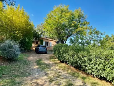 a car parked in front of a house at Holiday Home Weingut Punta della Guardia Panorama von Macchia und Meer by Interhome in Cervione
