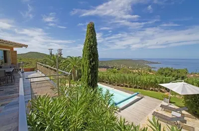 a villa with a pool and a view of the ocean at Villa Pierretti - Vue mer Panoramique in Coti-Chiavari