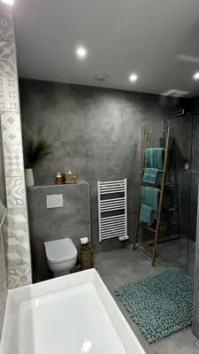 a bathroom with a toilet and a bath tub at Baia Serena in Ajaccio