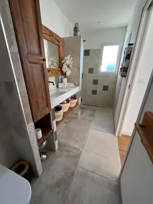 a bathroom with a sink and a shower at Maison de charme entre mer et nature 4pers in Cervione