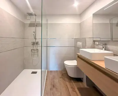 a bathroom with a toilet and a sink and a shower at Villa A Muredda, 6 pers, jacuzzi, 15 min plage en voiture in Porto-Vecchio