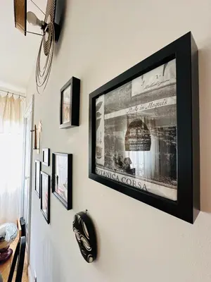 a shelf with a heart mirror and other items on it at Appartement premium Hyper Centre in Ajaccio