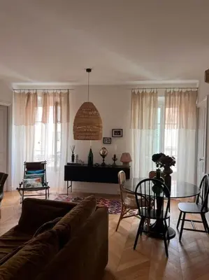 a living room with a couch and a piano at Appartement premium Hyper Centre in Ajaccio