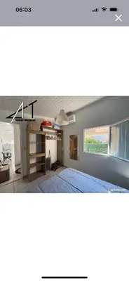 a bedroom with a bed and a window at A casa Patricia in Sari Solenzara