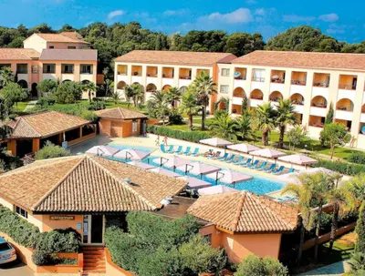an aerial view of a resort with a swimming pool at Appartement avec piscine en Bord de Mer - Corse in Linguizzetta