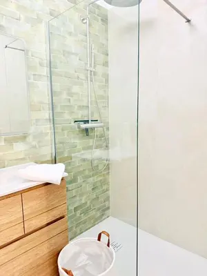 a bathroom with a shower and a sink at Studio neuf avec terrasse centre de Propriano in Propriano