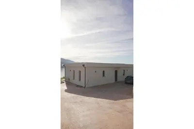 a house in the middle of a desert at villa la baies des anges in Calcatoggio