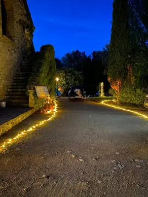 an empty street with lights on it at night at Chambres de charme - 2 chambres indépendantes avec salles de bains privatives in Corte