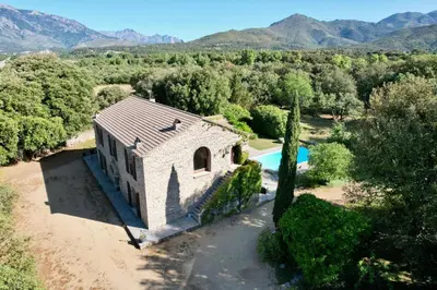 an aerial view of a house with a swimming pool at Chambres de charmes - 3 chambres indépendantes avec salles de bains privatives in Corte