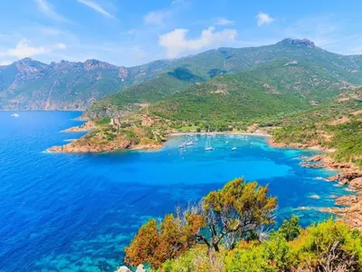an island in the middle of a large body of water at Mobil-home confortable avec terrasse pour 4 personnes à Vico - API-1-52-838 in Vico