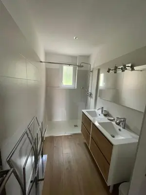 a bathroom with a sink and a mirror at Superbe appartement Solenzara in Sari Solenzara