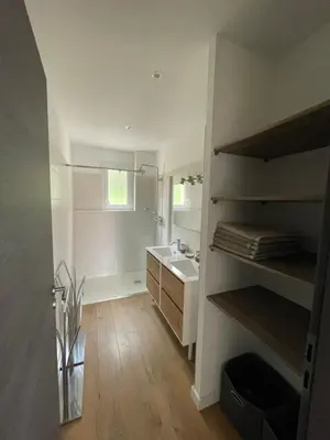 a bathroom with a sink and a mirror at Superbe appartement Solenzara in Sari Solenzara