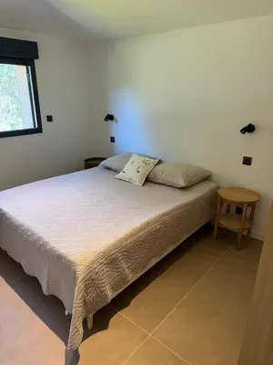 a small bathroom with a sink and a mirror at Porto-Vecchio, Villa luxueuse 8 pers, 4 chambres, piscine privée in Porto-Vecchio