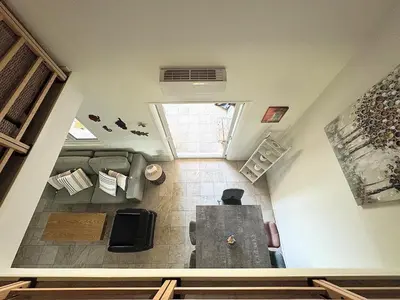 an overhead view of a room with a table in a house at Mini villa Stagnola in Pietrosella