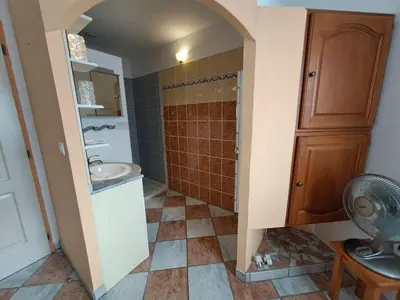 a bathroom with a shower and a sink at Villa Mare E Muntagna in Porto-Vecchio