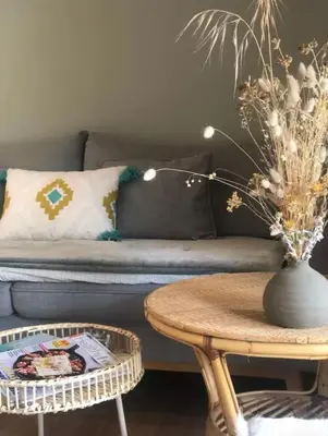 a bedroom with a white bed with two yellow pillows at Santa Giulia, Résidence Cala Sultana Numero 40 in Porto-Vecchio