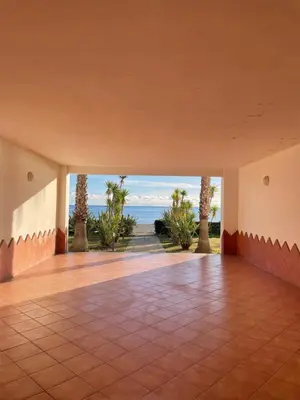 an empty room with a view of the ocean at Entre mer et montagne in San-Nicolao